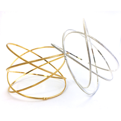 Orbit Wrap Bangle
Sterling silver
BROR01-S 165.
22K gold vermeil
BROR01-G 210. Orbit Wrap Bangle
Sterling silver
BROR01-S 165.
22K gold vermeil
BROR01-G 210.