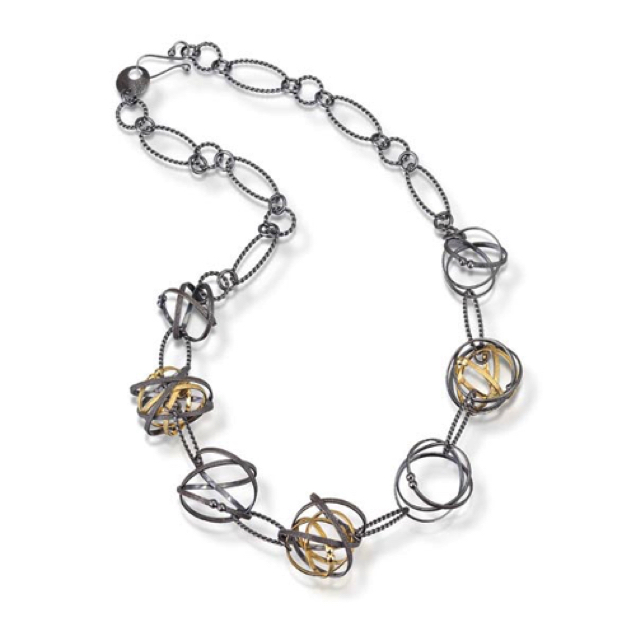 Petite Mixed Mobius Necklace - 19"
 
Oxidized sterling, 22K Gold vermeil
NKMB03-G-OX   595. (shown)
NKMB03-G-S   575. (bright silver)