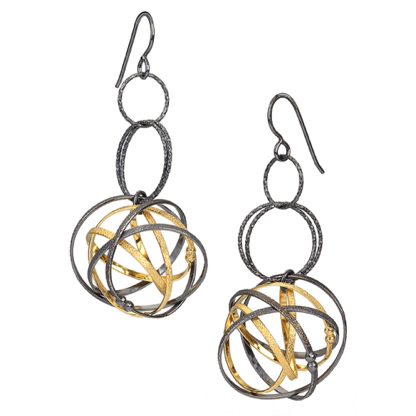 Mobius Mixed Triple Ring Earring 

Oxidized silver, 22K gold vermeil
ERDR34-G-OX
