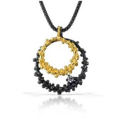 Pebble Double Circle Pendant Necklace
22K gold vermeil, oxidized silver, cubic zirconia