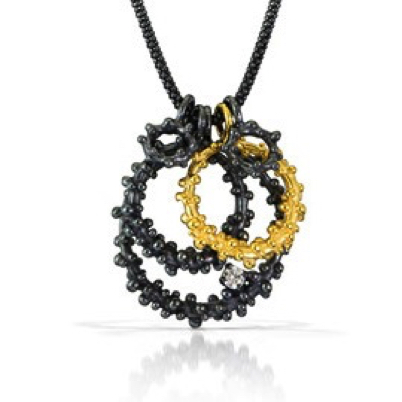 Pebble Quint Circle Pendant Necklace
22K gold vermeil, oxidized silver, cubic zirconia