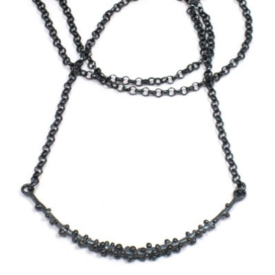 Pebble Crescent Necklace
Oxidized silver Pebble Crescent Necklace
Oxidized silver